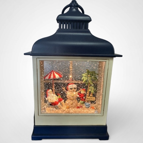 Snowing Blue Hamptons Lantern with Santa on Beach